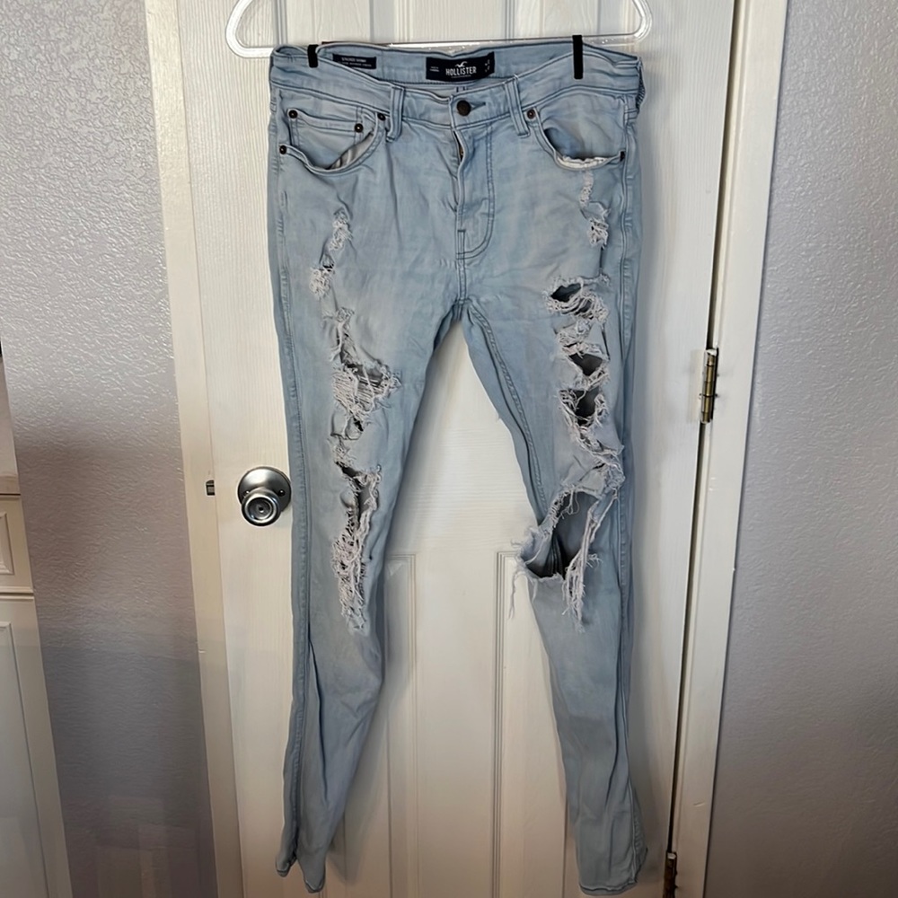 Hollister men’s stacked skinny light wash extremely distressed jeans